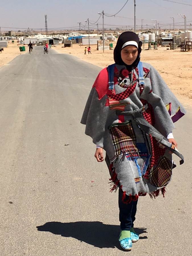 A TIGER Girl in Zaatari wearing the LoveCoats prototype